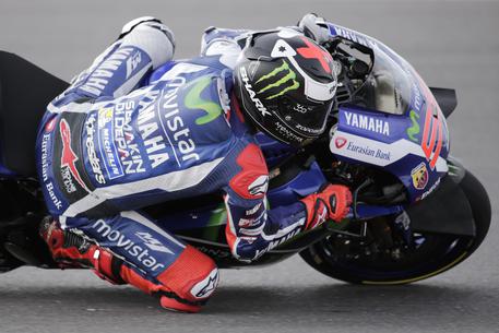 Moto GP rider Jorge Lorenzo of Spain takes a curve during a Moto GP training session at the Termas de Rio Hondo circuit in Argentina, Saturday, April 2, 2016. Argentina's Motorcycle Grand Prix will take place Sunday.(ANSA/AP Photo/Victor R. Caivano)