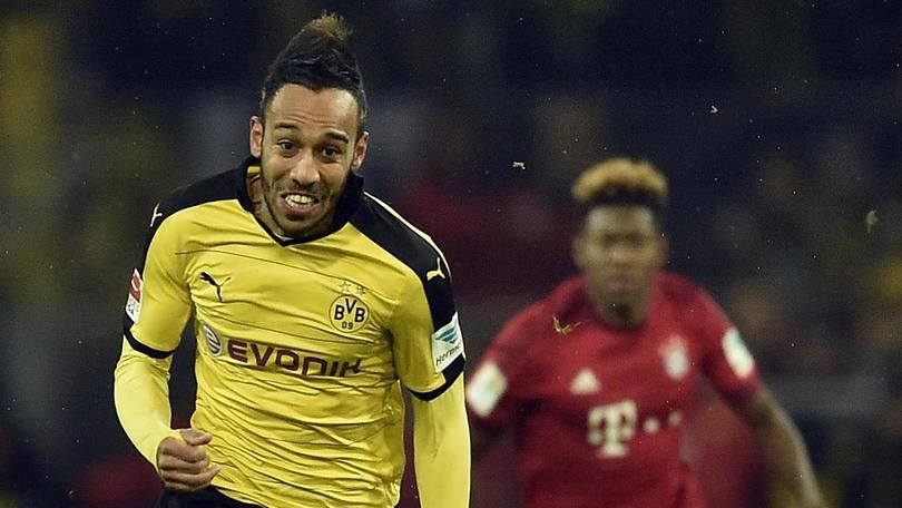 Dortmund's Pierre-Emerick Aubameyang attacks during the German Bundesliga soccer match between Borussia Dortmund and Bayern Munich, in Dortmund, Germany, Saturday, March 5, 2016. (ANSA/AP Photo/Martin Meissner)