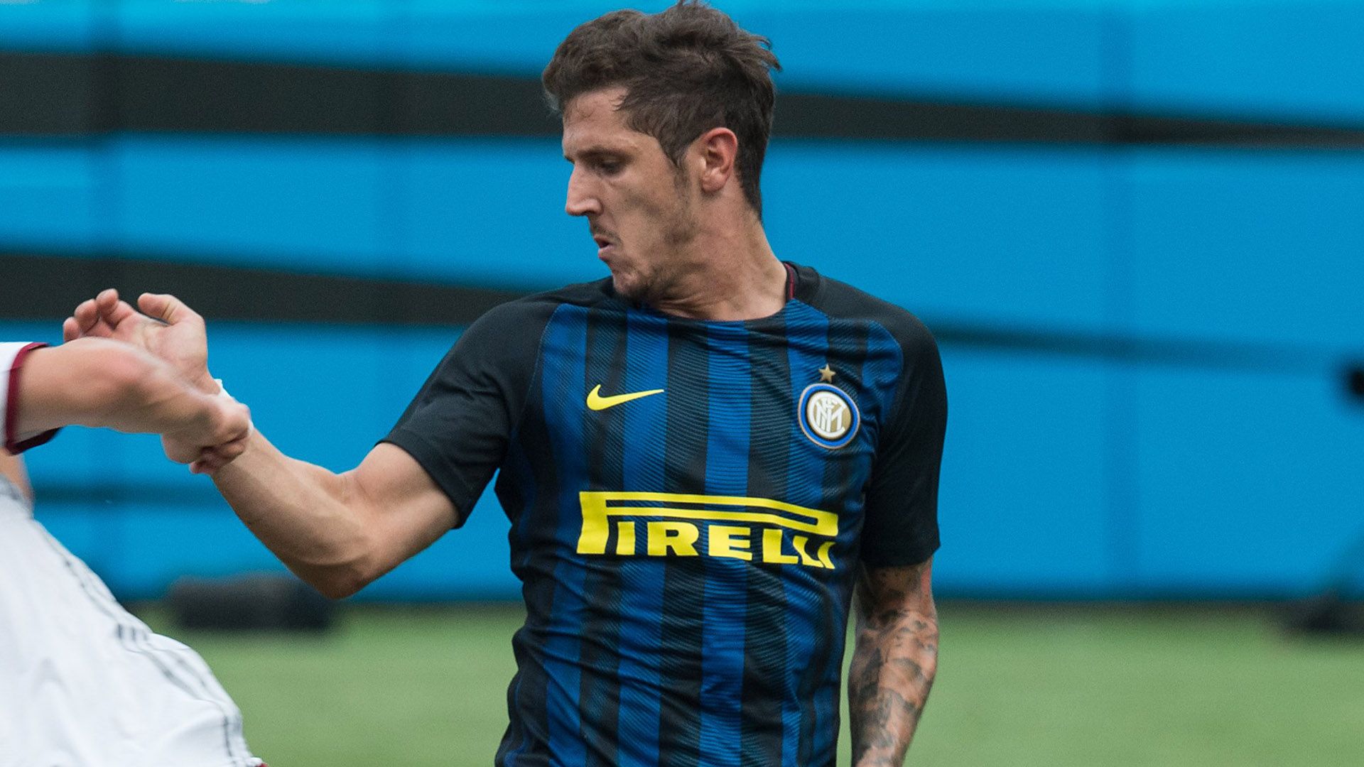 Inter Milan's Stevan Jovetic (R) vies with Bayern Munich's Niklas Dorsch during an International Champions Cup match in Chatrlotte, North Carolina, on July 30, 2016. / AFP / NICHOLAS KAMM        (Photo credit should read NICHOLAS KAMM/AFP/Getty Images)