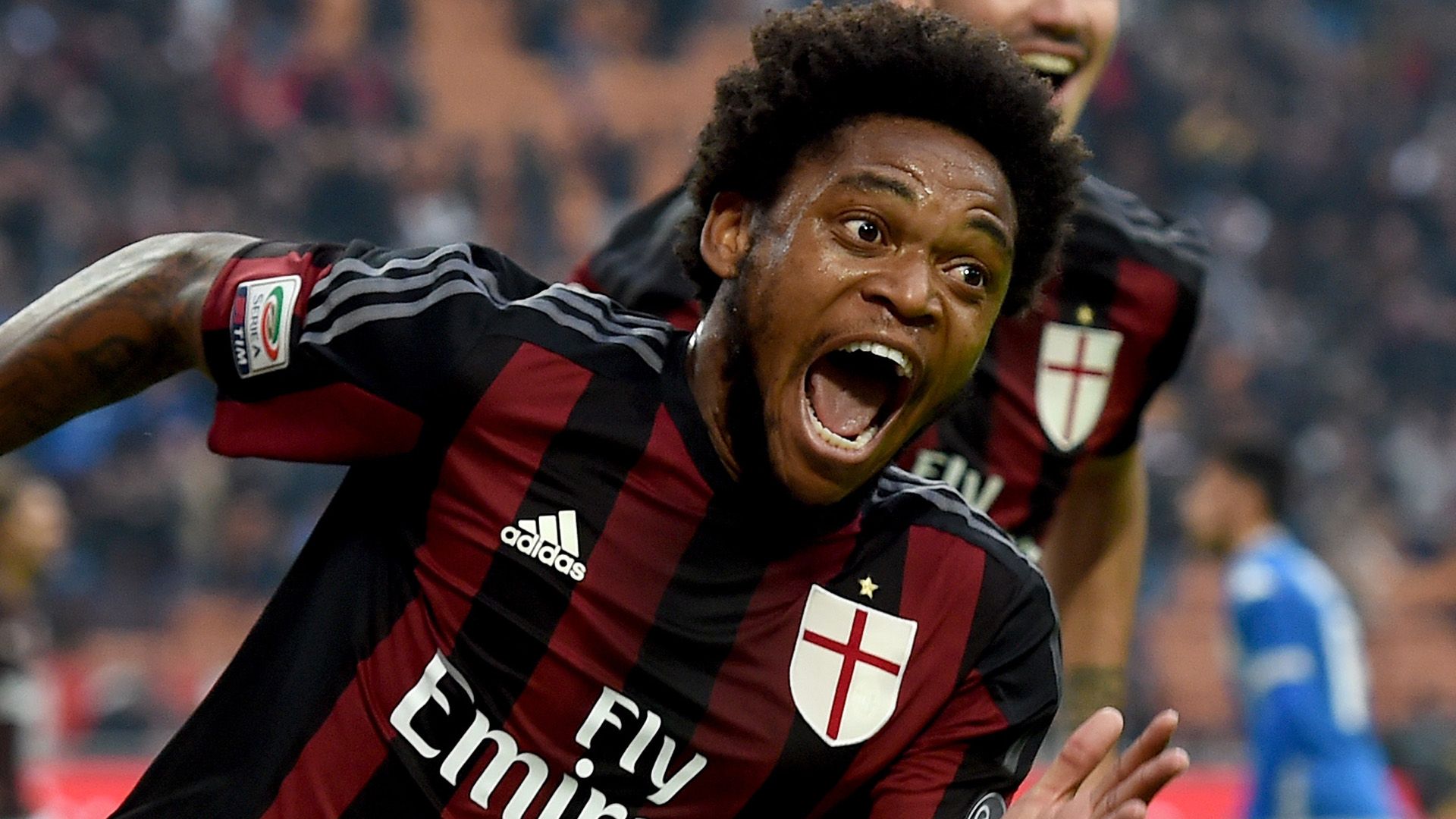 MILAN, ITALY - OCTOBER 25:  Luiz Adriano of AC Milan celebrates after scoring the second goal during the Serie A match between AC Milan and US Sassuolo Calcio at Stadio Giuseppe Meazza on October 25, 2015 in Milan, Italy.  (Photo by Claudio Villa/Getty Images)