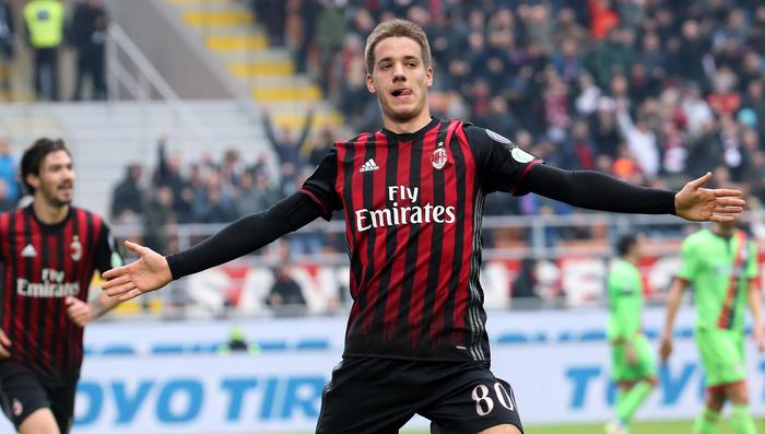 Milan's midfielder Mario Pasalic jubilates after scoring the 1-1 goal during the Italian serie A soccer match between Ac Milan and Fc Crotone at Giuseppe Meazza stadium in Milan, 4 December 2016. ANSA / MATTEO BAZZI