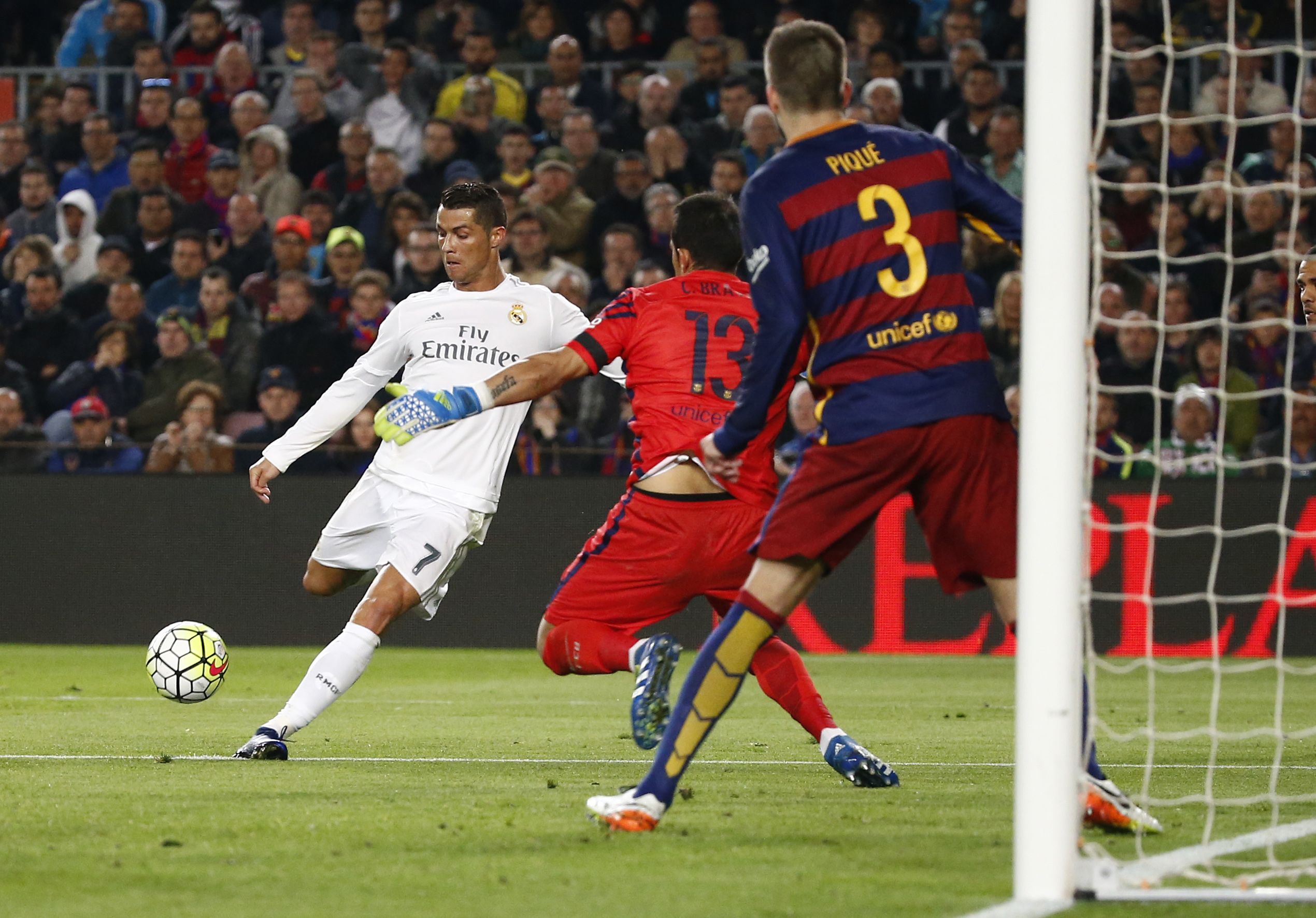 Football Soccer - FC Barcelona v Real Madrid - La Liga - Camp Nou, Barcelona - 2/4/16 Real Madrid's Cristiano Ronaldo scores their second goal Reuters / Juan Medina Livepic EDITORIAL USE ONLY.